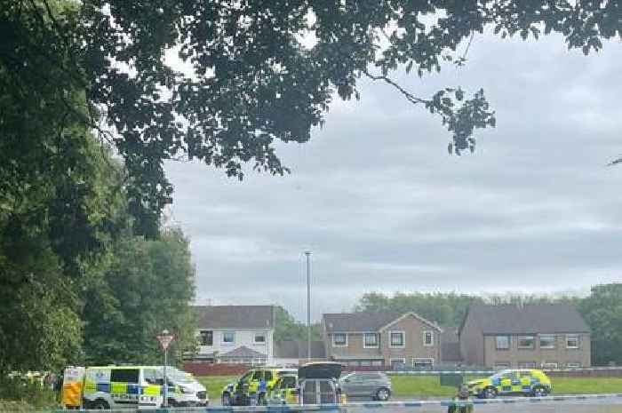 Armed cops swoop on Scots street after 'disturbance' as man rushed to hospital amid ongoing incident