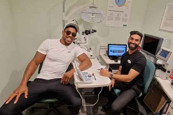 Anthony Joshua catches town's Specsavers staff off guard when he drops in for eye test