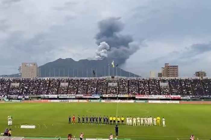 Incredible footage shows volcano erupting as football game is about to begin