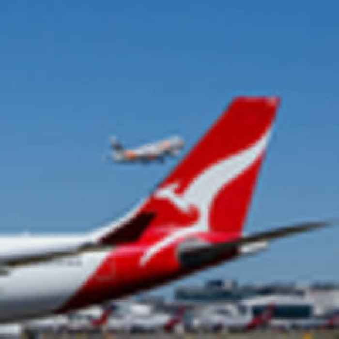 Qantas plane turned around after reports smoke was seen shooting from engine