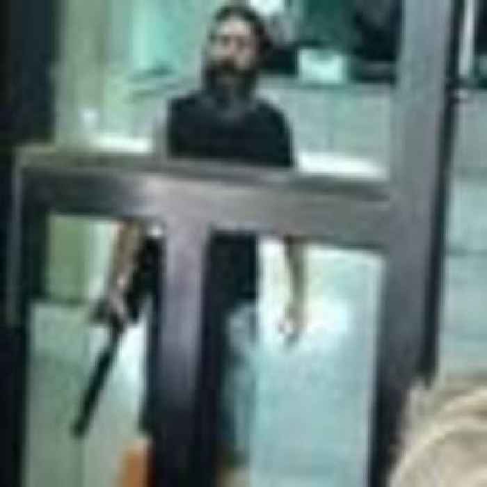 Gunman who tried to rob Beirut bank to get his trapped savings surrenders after hostage stand-off