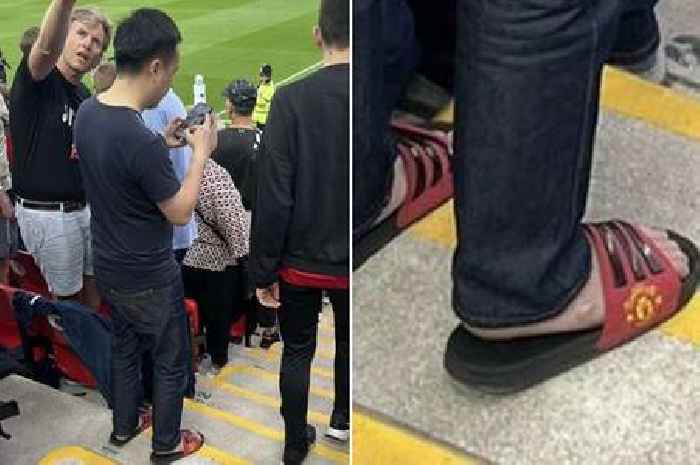 Fans gobsmacked as man wearing Man Utd sliders spotted in Liverpool stand at Anfield