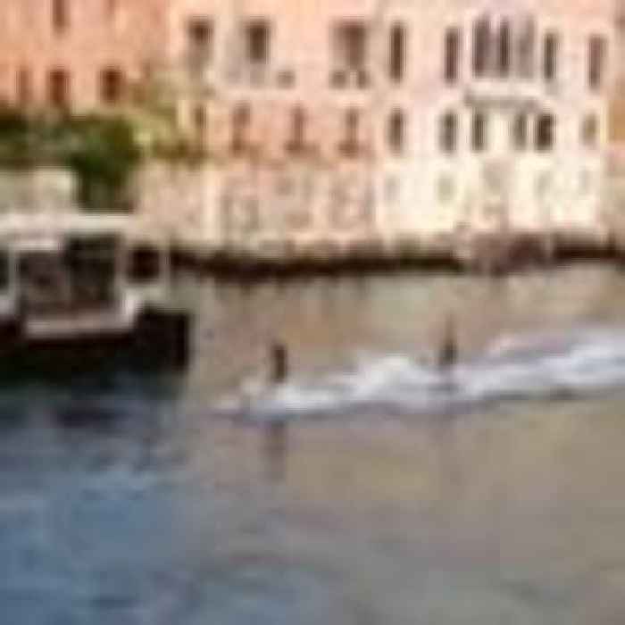 Venice fines tourist surfers for motoring down Grand Canal
