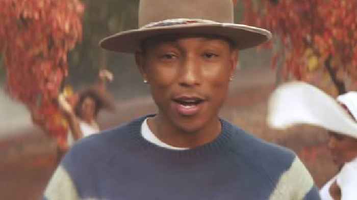 Pharrell Throws First Pitch At The Yankees-Mets Subway Series