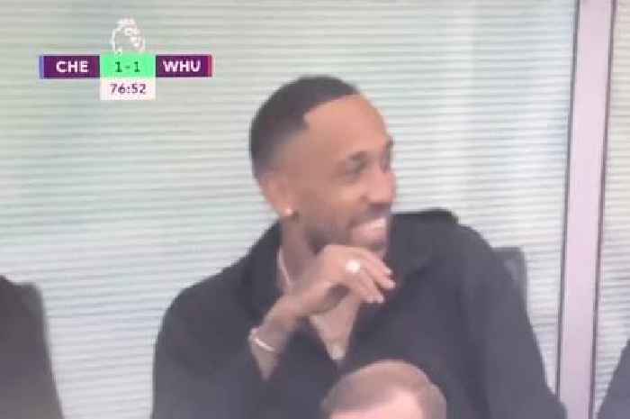 Pierre-Emerick Aubameyang reacts to Ben Chilwell finish watching Chelsea from the stands