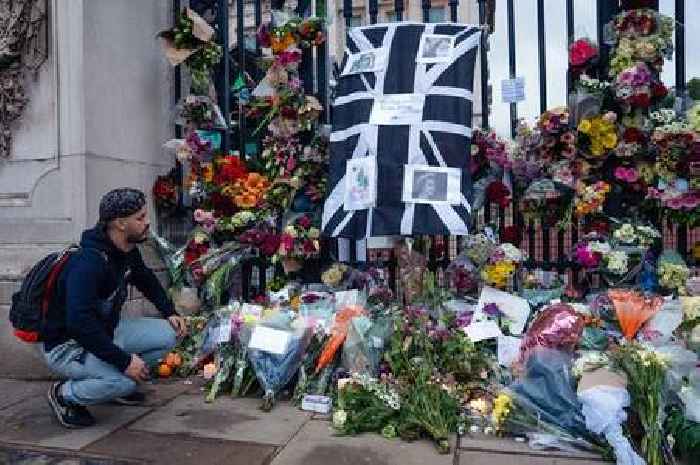 What happens now during Queen Elizabeth II's first day of mourning with a new king, flags at half mast and gun salutes