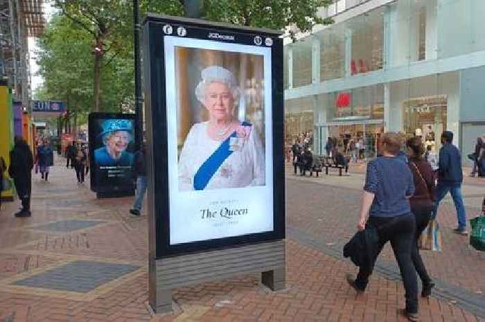 City centre screens switch from tributes to the Queen to ads for Burger King