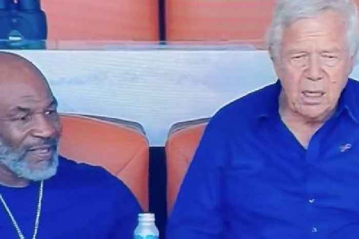 Mike Tyson and Patriots owner Robert Kraft have awkward handshake at NFL game