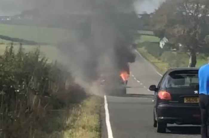 Car bursts into flames on road in Ayrshire as emergency crews race to scene