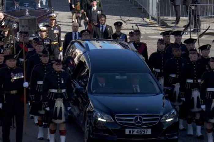 King Charles leads emotional procession from Royal Mile to St. Giles cathedral for Queen's coffin