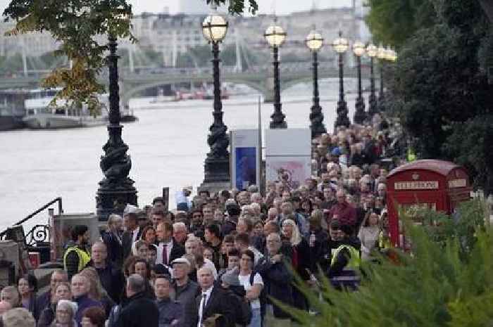 Mourners in 'the queue' to see the Queen's coffin face getting wet as showers forecast