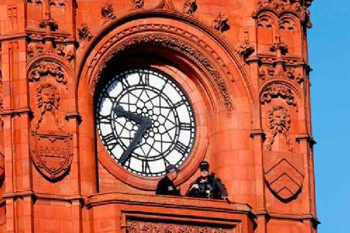 Police spotters on top of Cardiff buildings keeping eye on crowds during King Charles visit