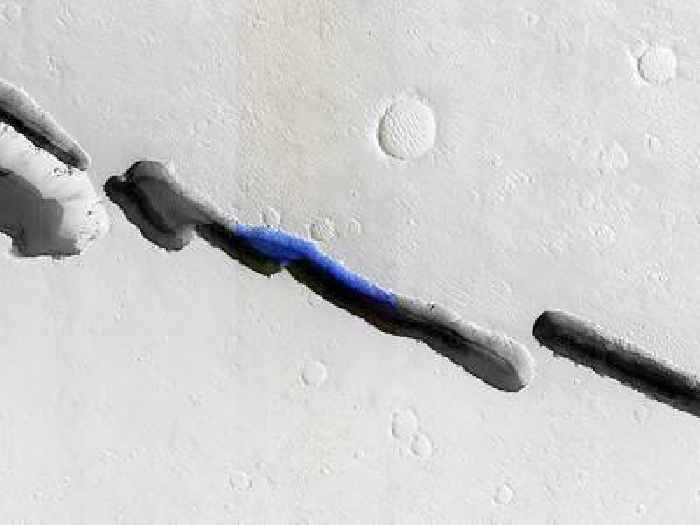 Surface Collapses Strangely Over on Mars, You’ll Never Guess How Deep This Blue Rift Is