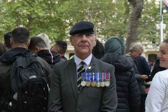 Lone veteran pays tribute to 'his boss' the Queen as thousands line London for state funeral