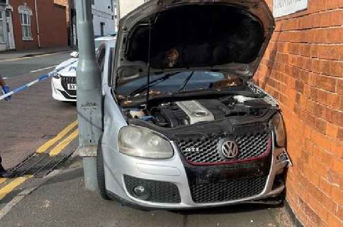 Car gets stuck between lamppost and wall after Sparkhill crash