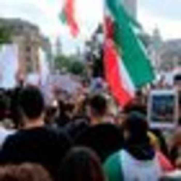 Protesters and police clash outside Iranian embassy in London