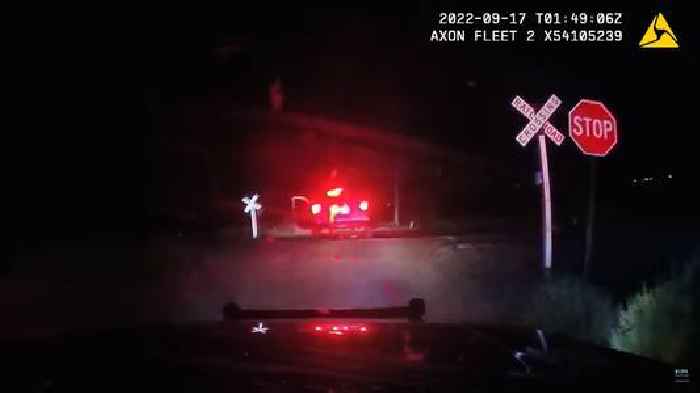 Dramatic Video Shows Train Hitting Colorado Police Cruiser With Suspect Handcuffed Inside