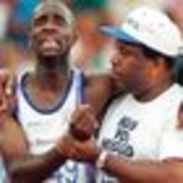 Father who helped son over line in iconic Olympic moment dies aged 81