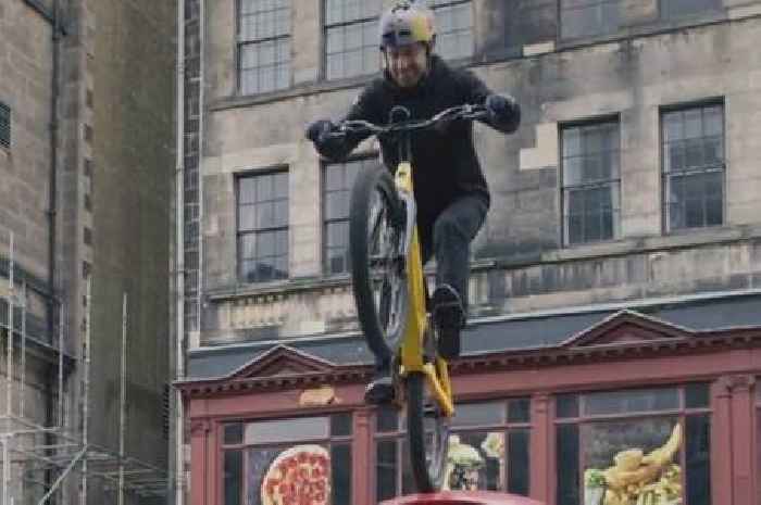 Danny MacAskill jumps bike onto brand new iPhone 14 in Edinburgh in latest stunt