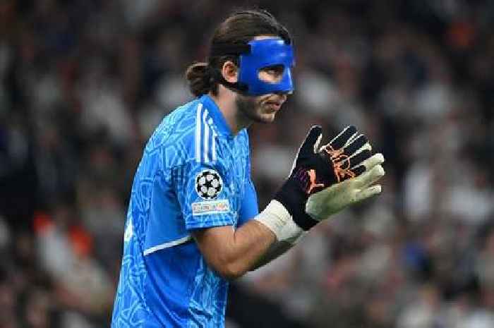 Former Liverpool keeper unrecognisable in mask as he thwarts Man City in Champions League