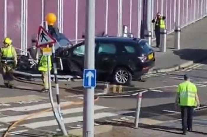 Man charged after car crashes through railings at Edinburgh Airport