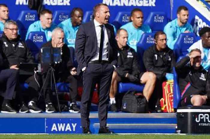 Brendan Rodgers reacts to Leicester City fan banner and sack chants after conversation with Top