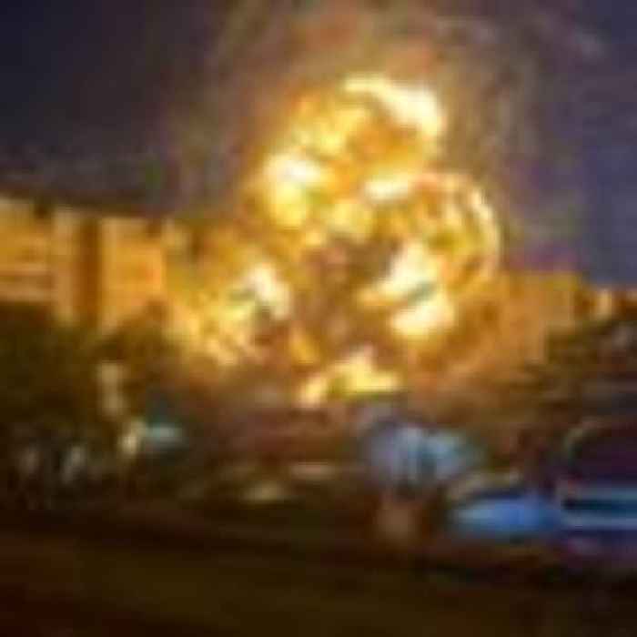 Warplane crashes into Russian apartment block killing at least 13 people