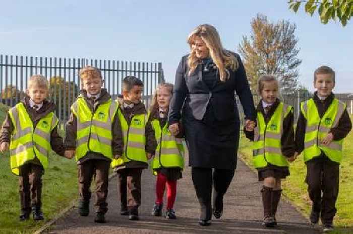 Housebuilder donates hi-vis vests to improve school travel safety for children in Lanarkshire village