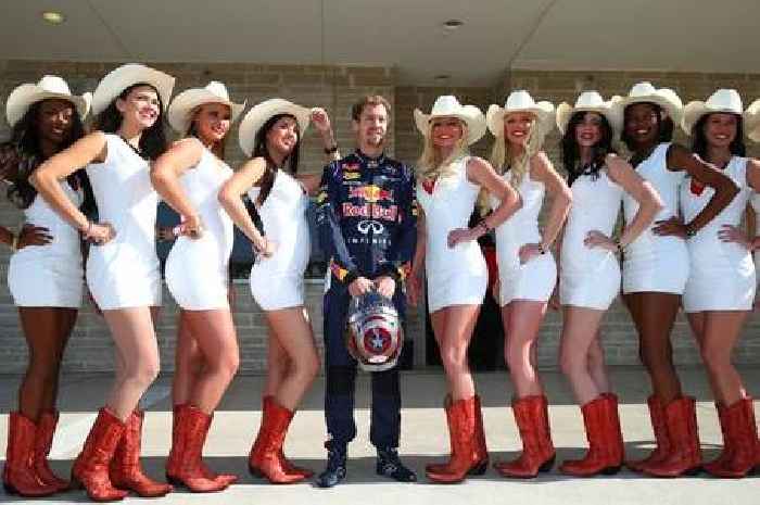 Sebastian Vettel looked delighted as he posed with nine grid girls at United States GP