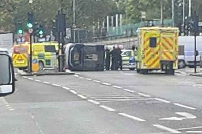 Car flips on its side in Rainham Road Dagenham crash as emergency services rush to scene