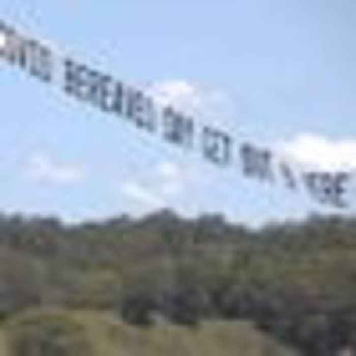 'Get out of here': Protest group flies anti-Hancock banner over I'm a Celebrity jungle