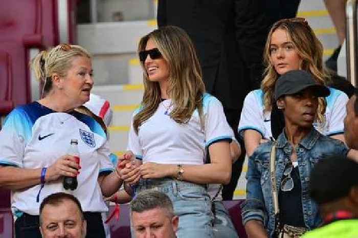 Glamorous England WAGs don their World Cup kits in the stands for opening game vs Iran
