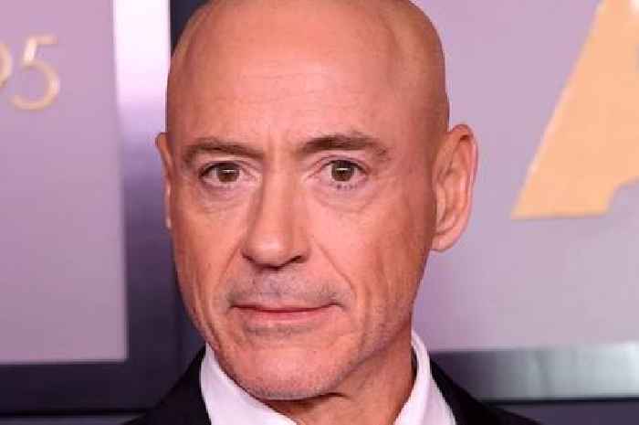 Robert Downey Jr debuts bald head at awards show as fans left floored