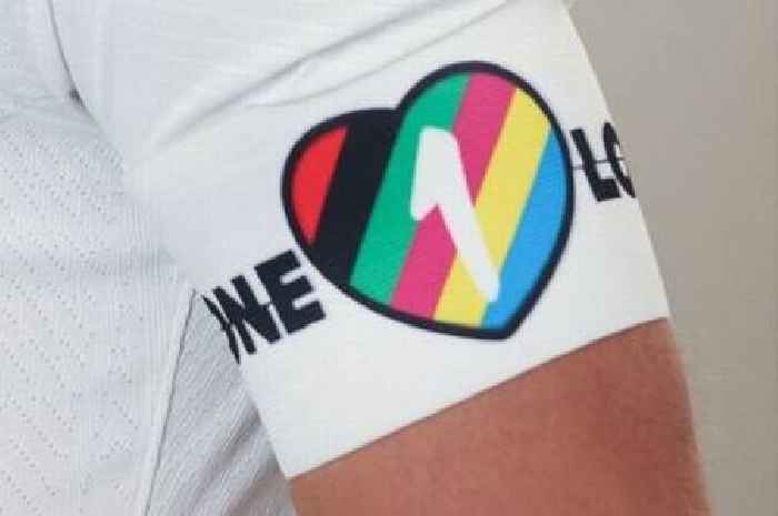 What is the OneLove armband and why are England and Wales now not wearing it?