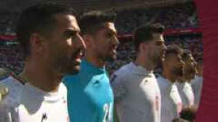 Iran players sing national anthem before Wales game