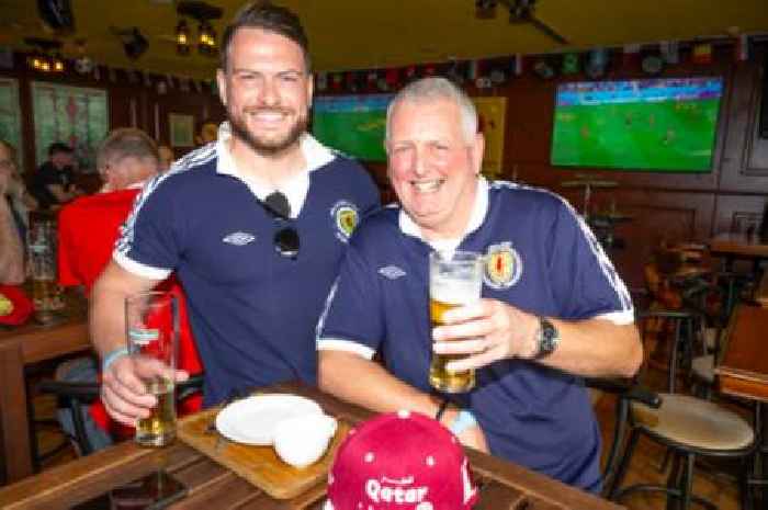 Hearts-daft father and son flying flag for Scotland at World Cup in Qatar
