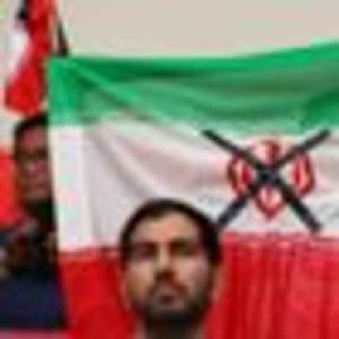 Iran regime supporters and protesters confront each other ahead of Wales match