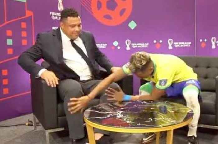Brazil star Rodrygo caresses Ronaldo's legs to try and get his ability to rub off on him