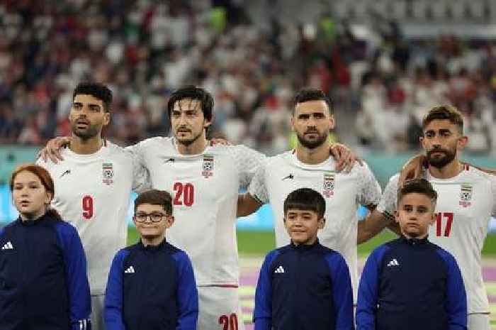 Iran players sing national anthem before USA game after 'families threatened'