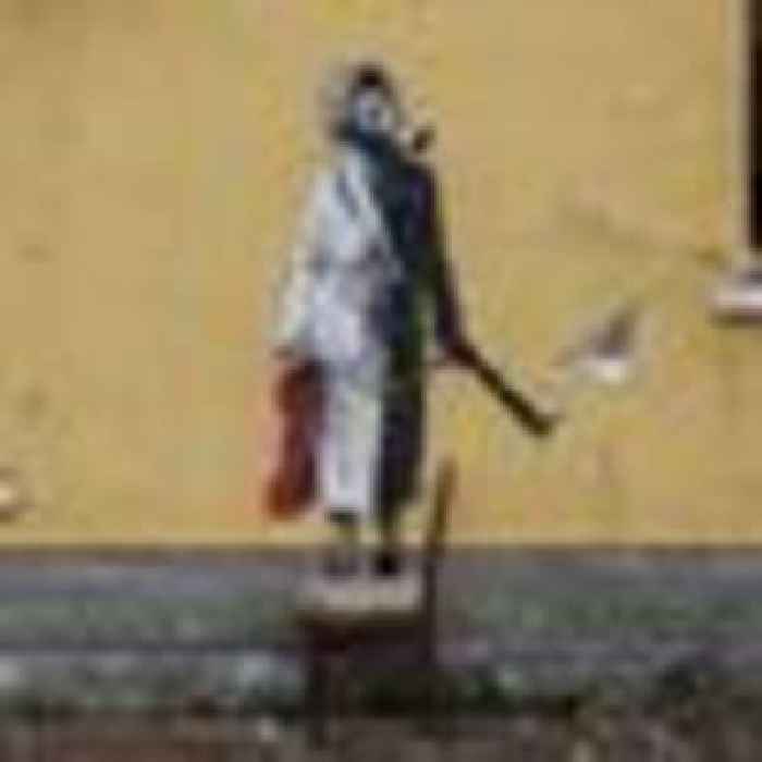 Group try to steal Banksy mural from wall in battle-scarred Ukrainian town