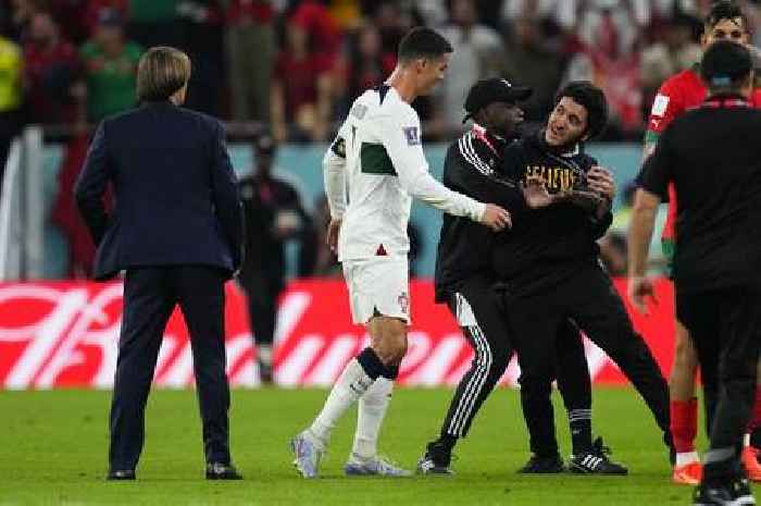 Crying Cristiano Ronaldo approached by pitch invader after World Cup heartbreak