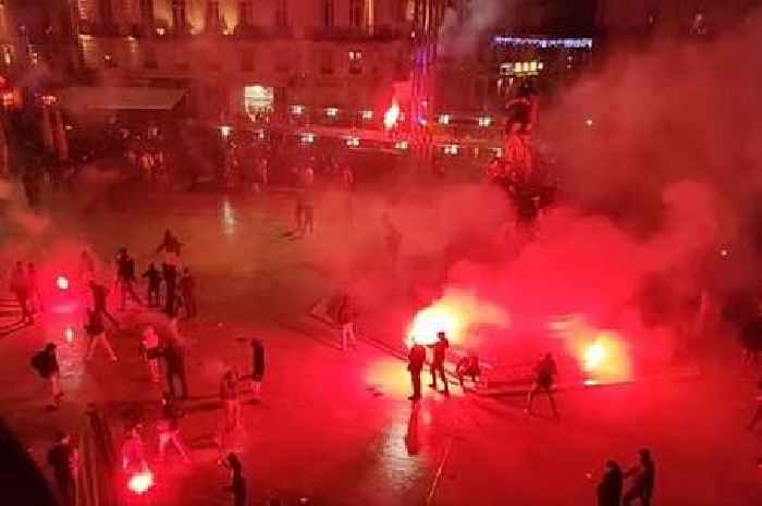 France and Morocco fans throw fireworks in street during violent brawl as riot police step in