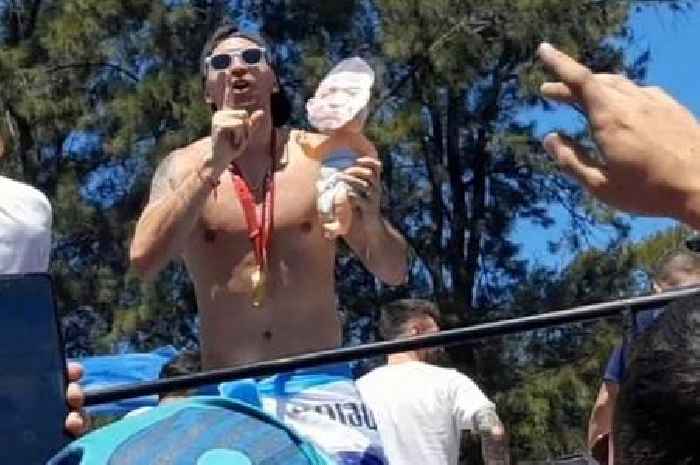 Argentina 's***house' Emi Martinez mocks Kylian Mbappe with crying doll at parade