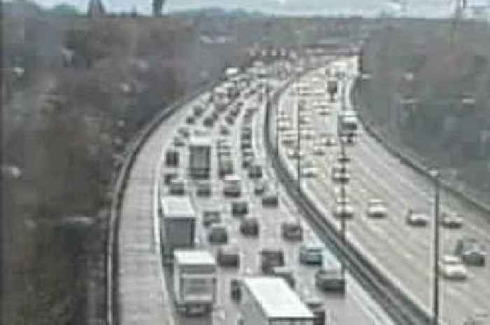 Live M25 traffic updates today as two lanes in Surrey closed due to flooding