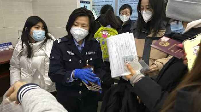 China To Resume Issuing Passports, Visas As Virus Curbs Ease