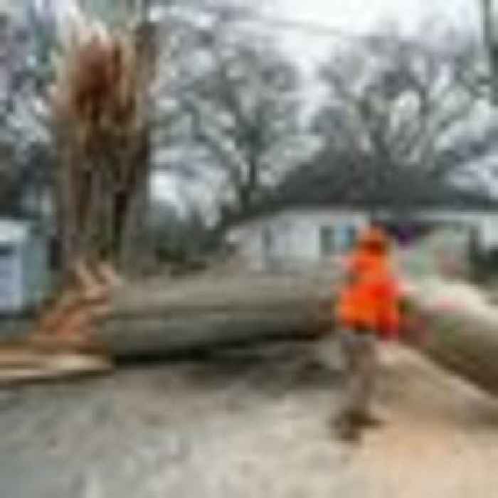 At least nine dead after US tornadoes hit southern states - as tens of thousands left without power