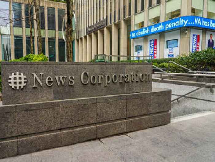 What made News Corp stock gain 10% on Wednesday?