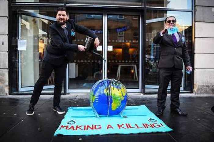 Extinction Rebellion activists stage protest outside Barclays in Glasgow