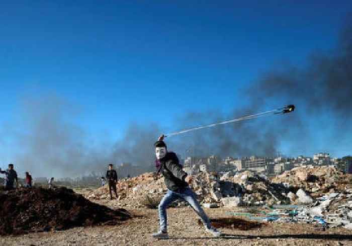 Israeli settlers target Palestinian homes in terror attacks 'price tag'