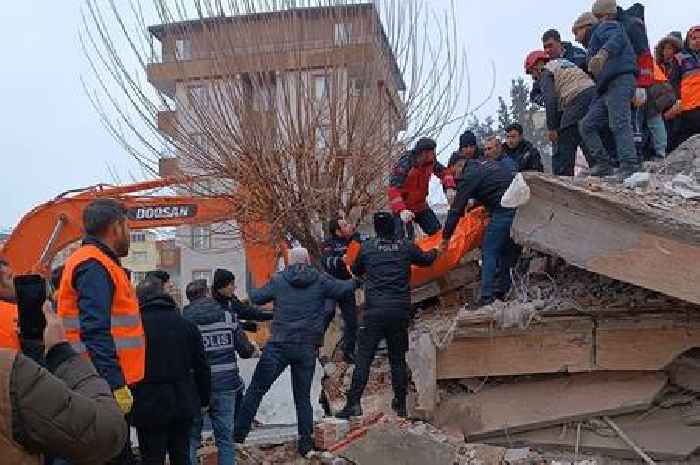 Earthquake death toll passes 7,700 as search teams and emergency aid arrive